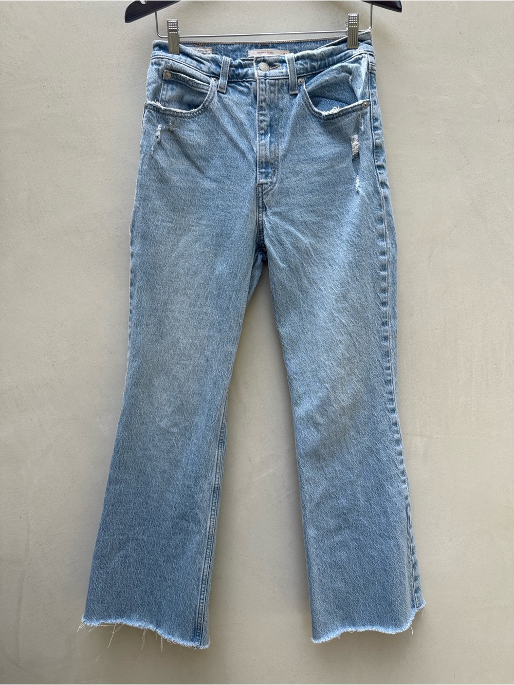 Levi’s 70s High Flare Jeans Size 27 High Rise Flare Raw Hem Light Medium Wash